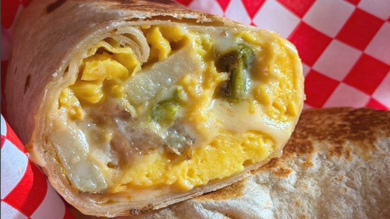 Half of a breakfast burrito from Paffuto