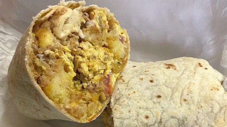 Breakfast burrito cut in half from Lorena's Deli