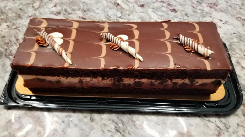 A Costco Tuxedo chocolate cake on a granite countertop