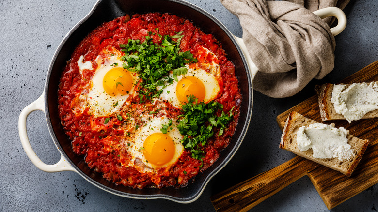 Shakshuka with eggs and bread
