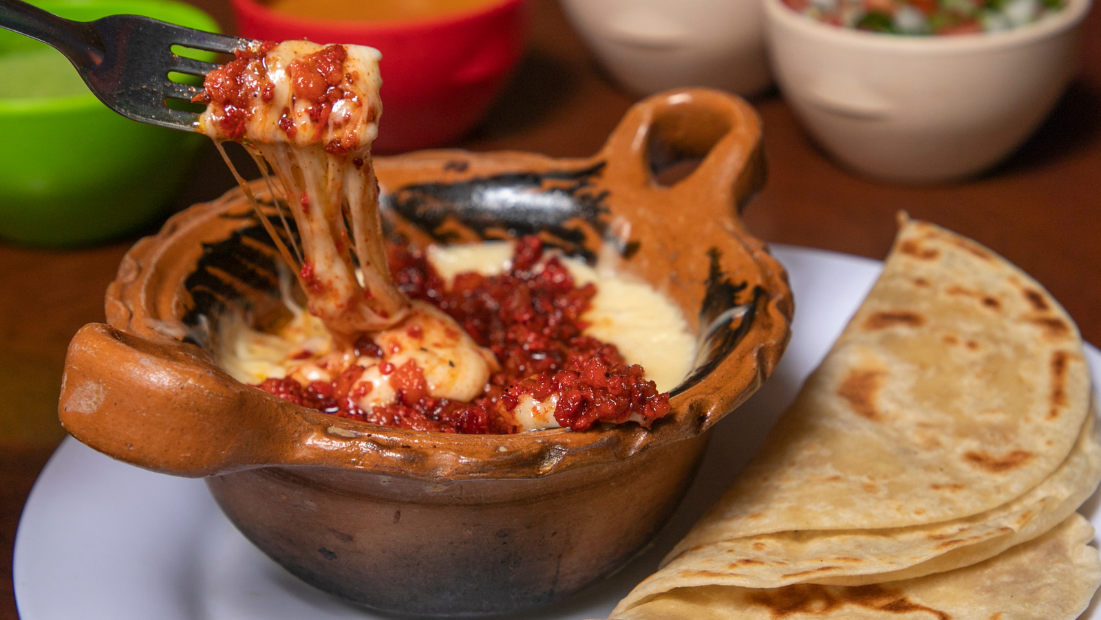 The Best Cheeses To Make The Star Of Your Queso Fundido Tacos
