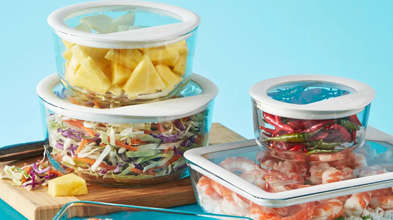 various sizes of lidded pyrex containers full of food