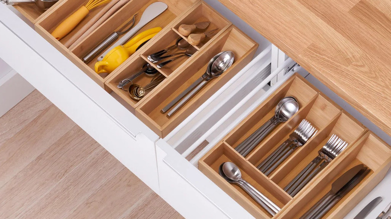 open kitchen drawers with organized compartments