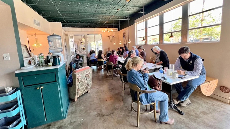 Customers sitting in CrashMurderBusiness coffeeshop