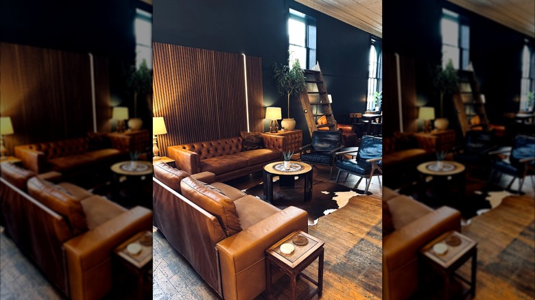 Leather couches and tables inside Coffeeology