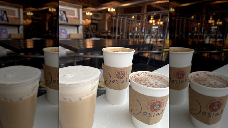 Three Josiah's coffee cups pictured on a white table