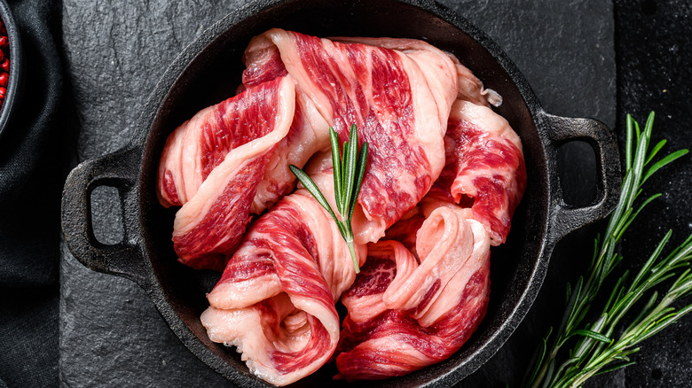 raw, marbled beef bacon