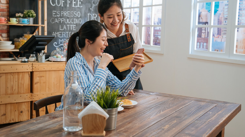 Cafe customer and server