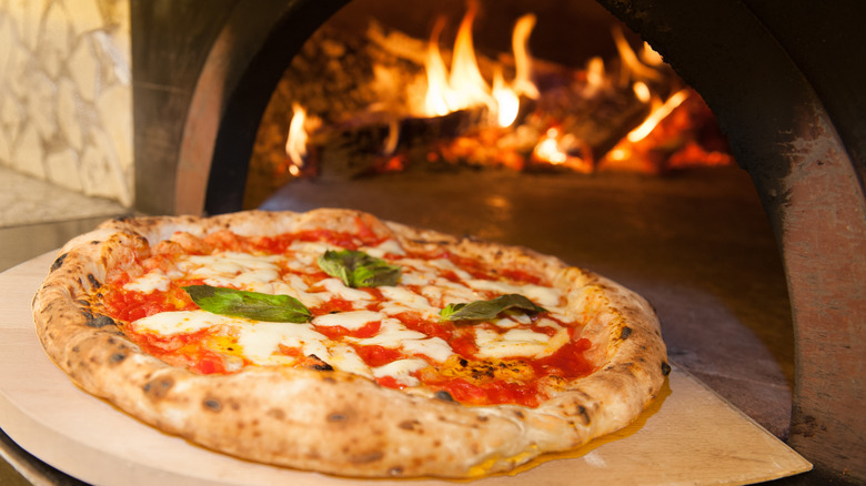 Neapolitan pizza in brick oven 