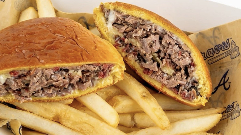 A close up of The Baffle beef sandwich with fries