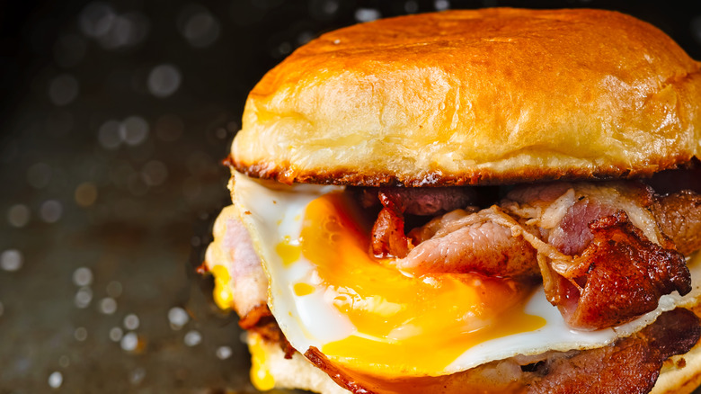 Egg and bacon sandwich on a buttery bun