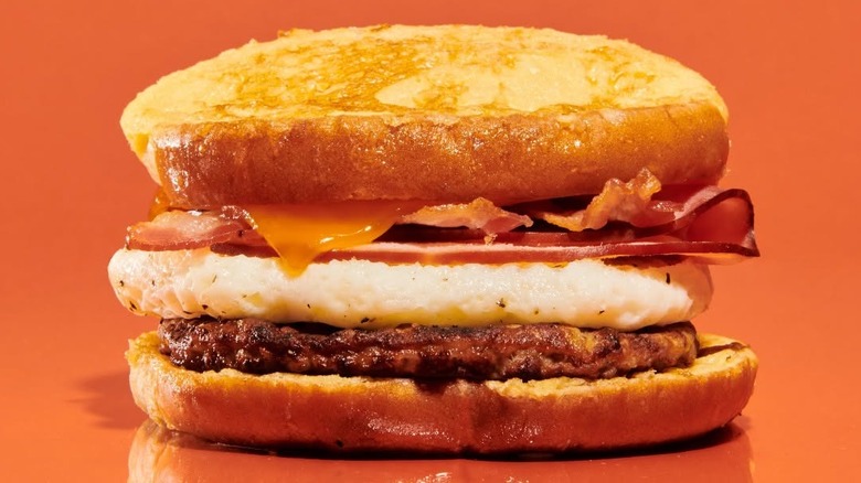 Maverik French Beast sandwich with ham, egg, sausage, and bacon on French toast bun