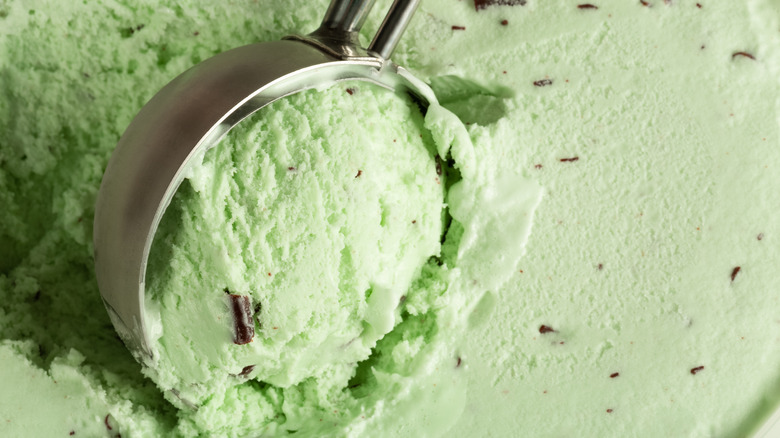 Scooping mint chocolate chip ice cream