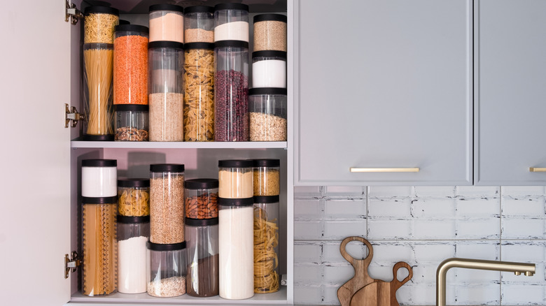 An organized kitchen pantry, full of dried goods