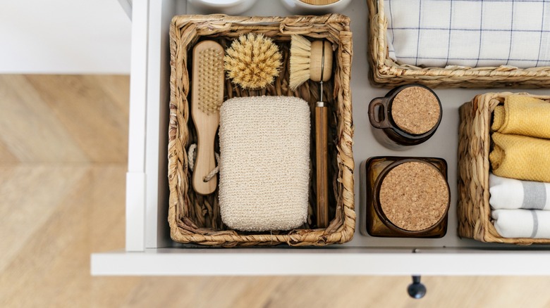 Drawer with wicker baskets of organized items