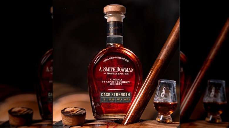 A bottle of A. Smith Bowman Cask Strength Batch #4 2025 on top of a whiskey barrel