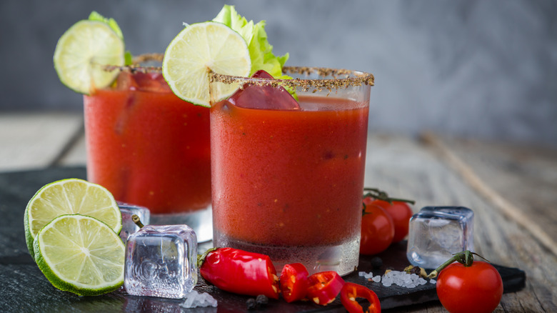 Two Bloody Marys in glasses