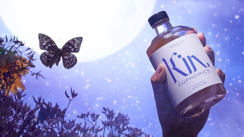 Kin Euphorics held in hand