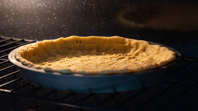 Pie crust baking in oven