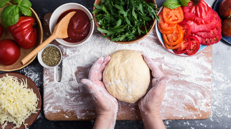 Pizza dough and ingredients