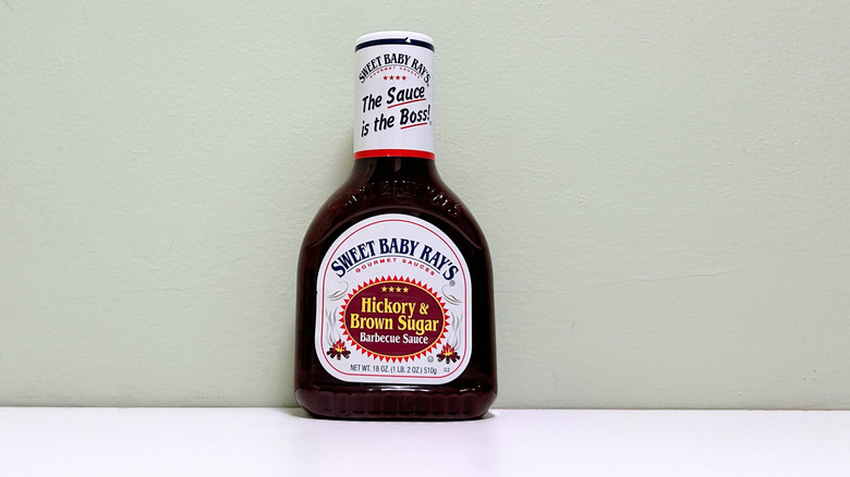 Hickory brown sugar Sweet Baby Ray's bottle on white surface