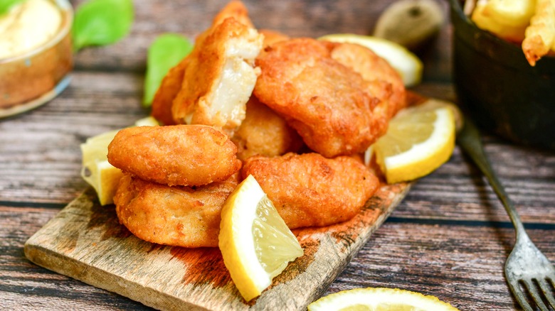 Breaded fried fish with lemon
