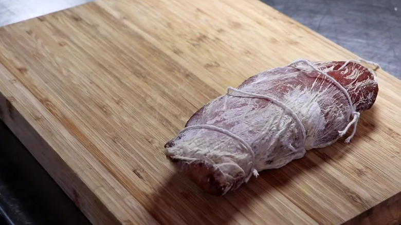 Guanciale on cutting board