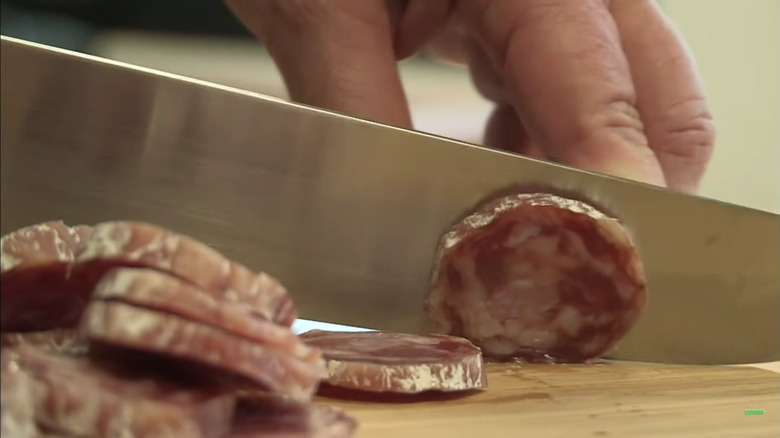 Saucisson Sec being cut