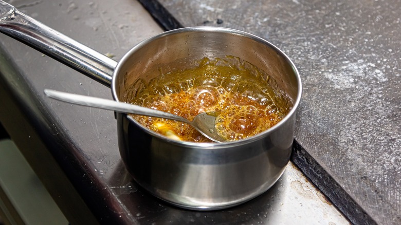 caramelizing sugar in a pot