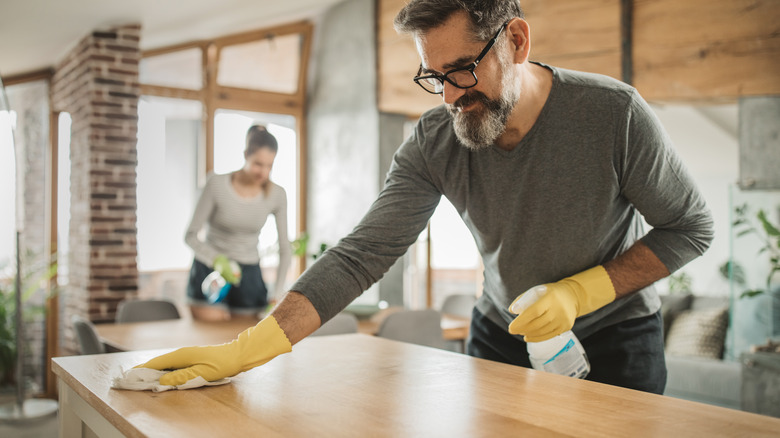 man cleaning the kitchen