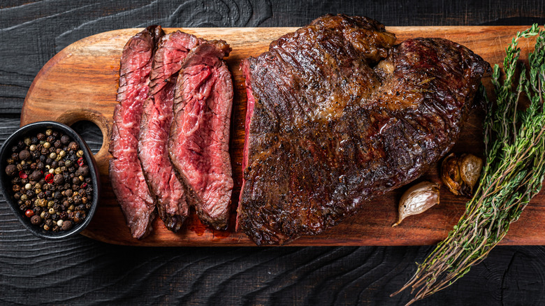 sliced hanger steak with rosemary