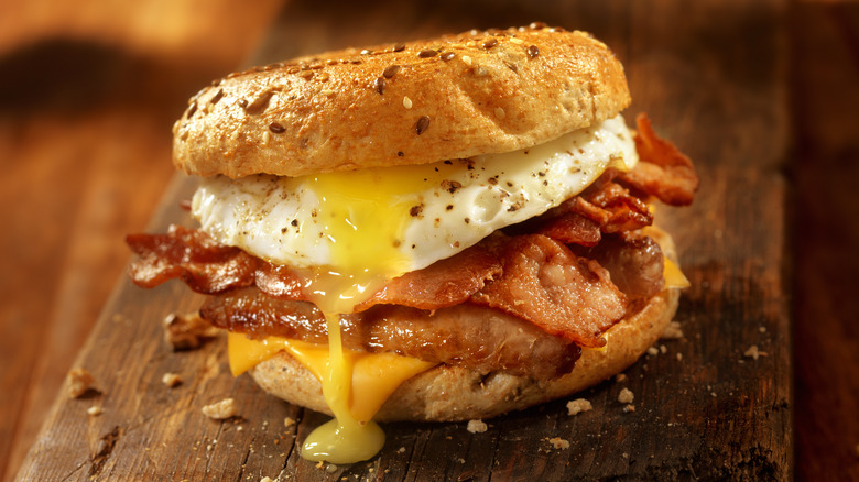 runny egg sandwich on bagel