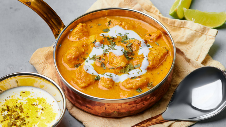 Bowl of butter chicken yellow curry