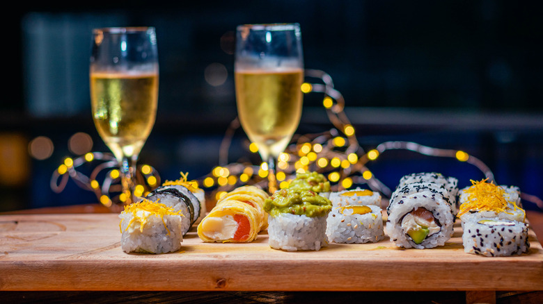 Sushi spread with champagne