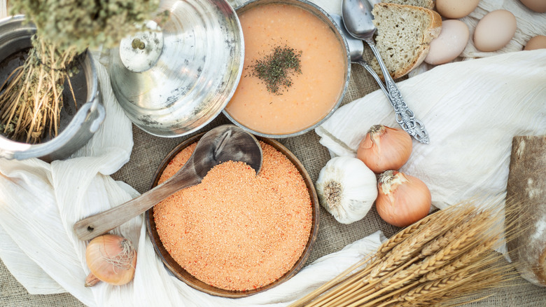 ingredients for tarhana surround a bowl of soup