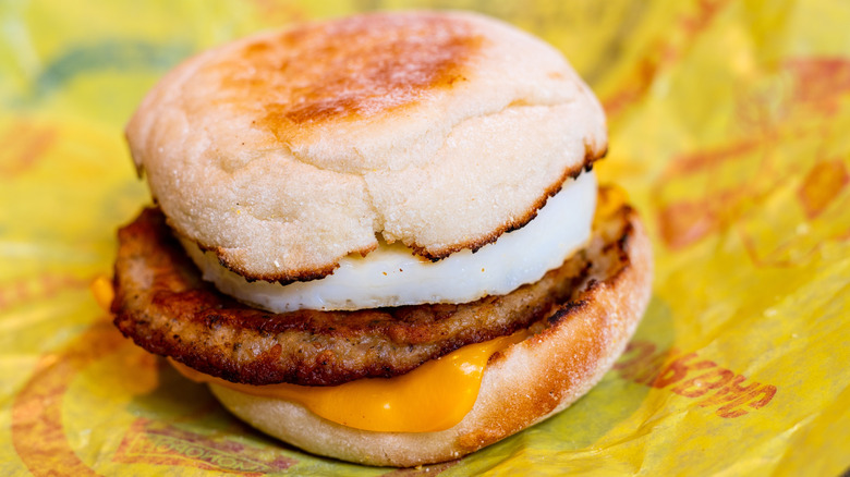 a McDonald's Sausage and Egg McMuffin is seen on its wrapper