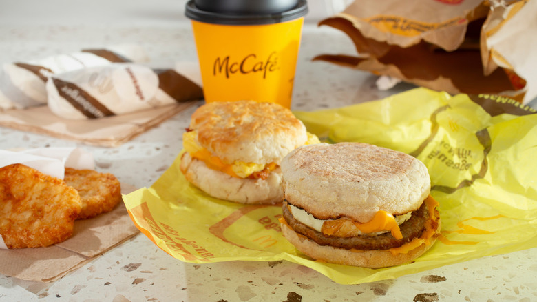 McDonald's breakfast and McCafe coffee cup with hashbrowns