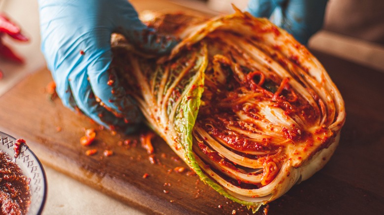 Person making kimchi 