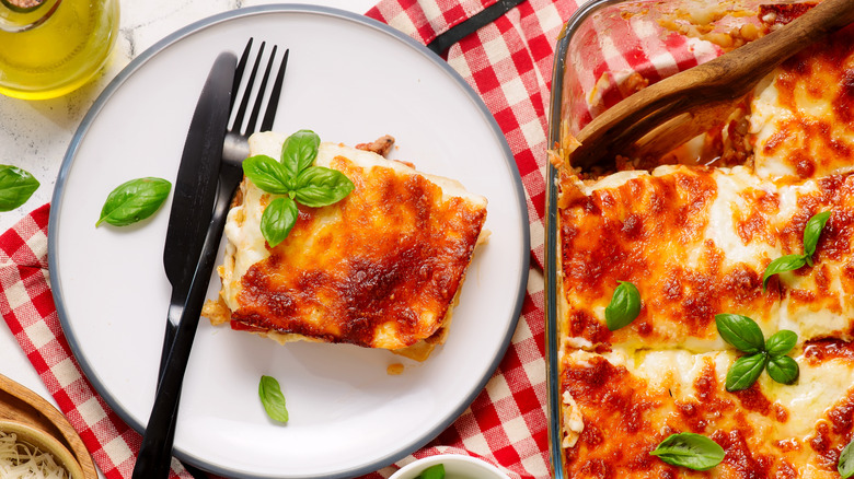A delectable plate of lasagna served in a baking dish.