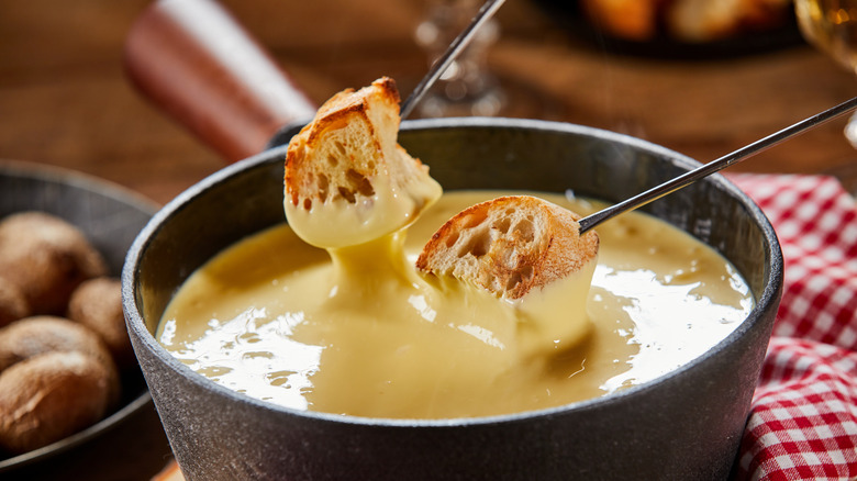 bread dipped in cheese fondue