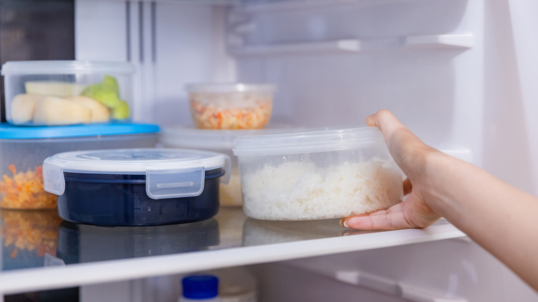 Cold rice in container in fridge