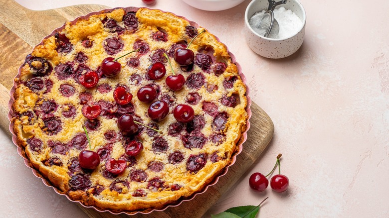 Cherry clafoutis on cutting board
