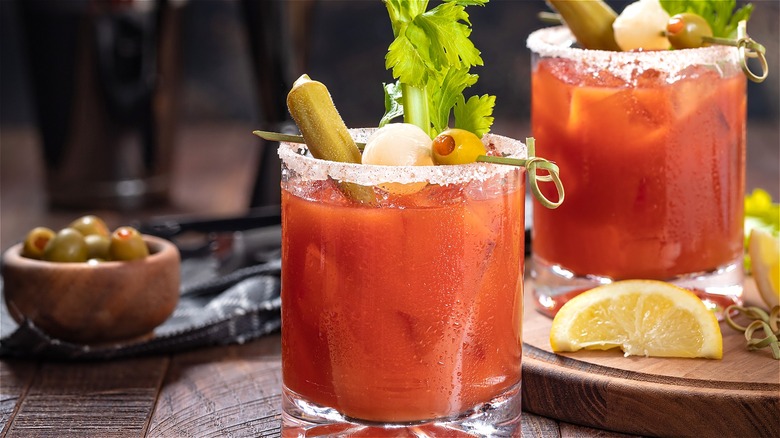 Bloody Marys with olives and celery 