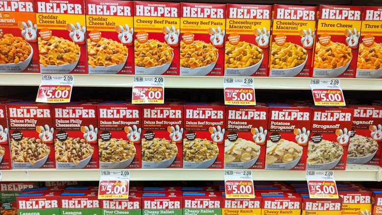 Boxes of General Mills Hamburger Helper Macaroni and Cheese Dinner product on shelf