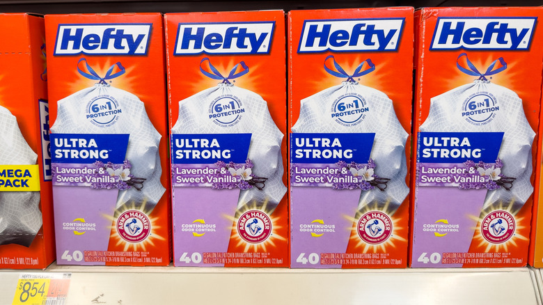 A row of Hefty ultra strong lavender and sweet vanilla scented trash bags on a store shelf