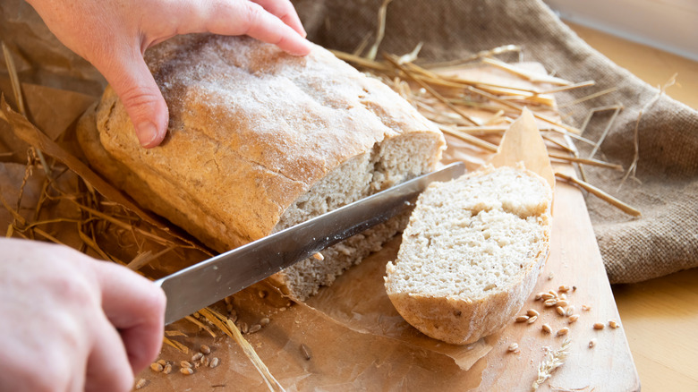 slicing fresh bread