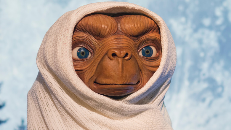 E.T. the Extra-Terrestrial alien statue in blanket