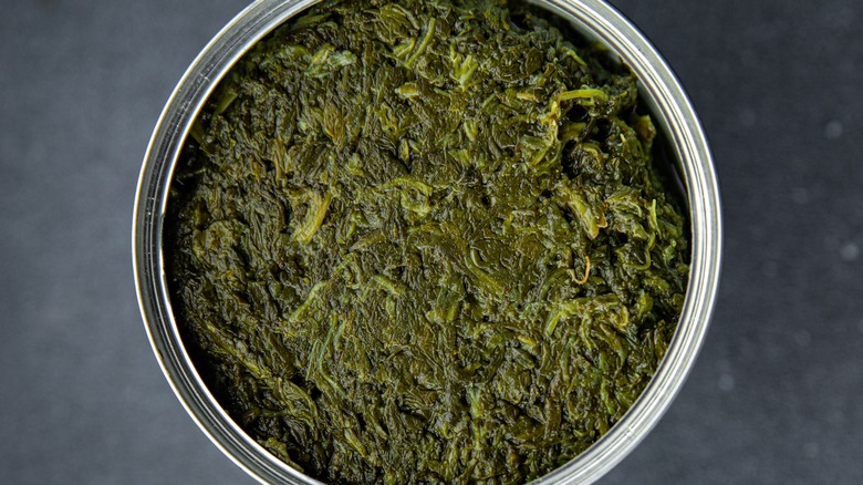 open can of spinach
