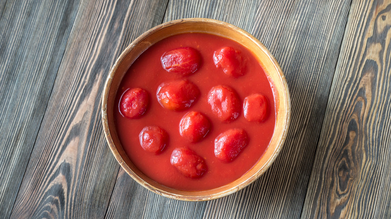 Canned tomatoes in bowl 