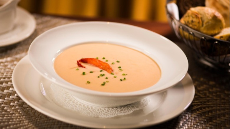 A bowl of Lobster Bisque in a white bowl from The Capital Grille